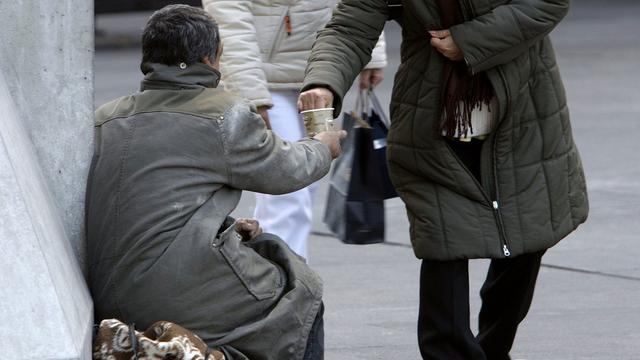 La loi interdisant la mendicité à Genève a été suspendue suite à une décision de la CEDH. [Keystone - Salvatore Di Nolfi]