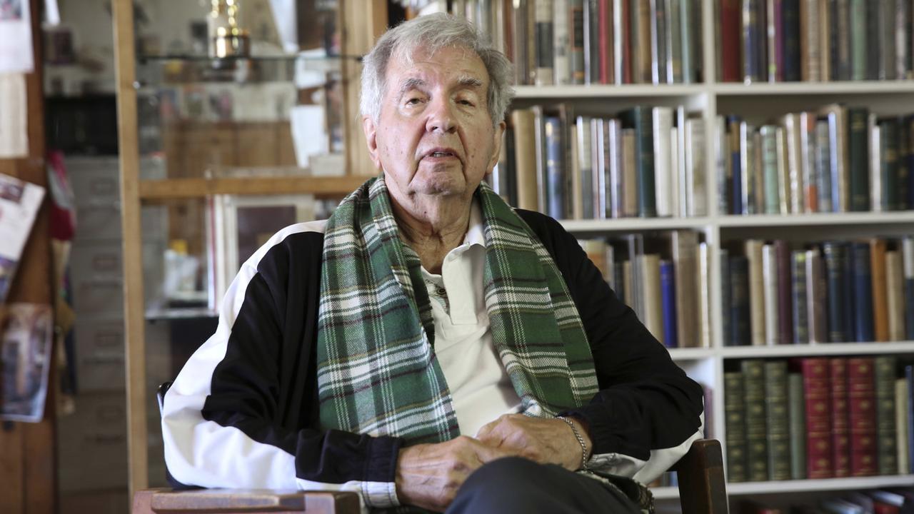 Larry McMurtry dans sa librairie d'Archer City au Texas en avril 2014. [AP/Keystone - LM Otero]