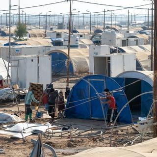 Des familles de déplacés doivent quitter leur camp en Irak. [Reuters - Charlotte Bruneau]