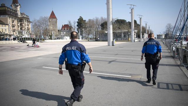 Des policiers patrouillent à Lausanne (Image d'illustration) [Keystone - Laurent Gillieron]