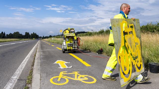 Le Valais teste une piste cyclable photoluminescente (image prétexte). [Keystone - Jean-Christophe Bott]