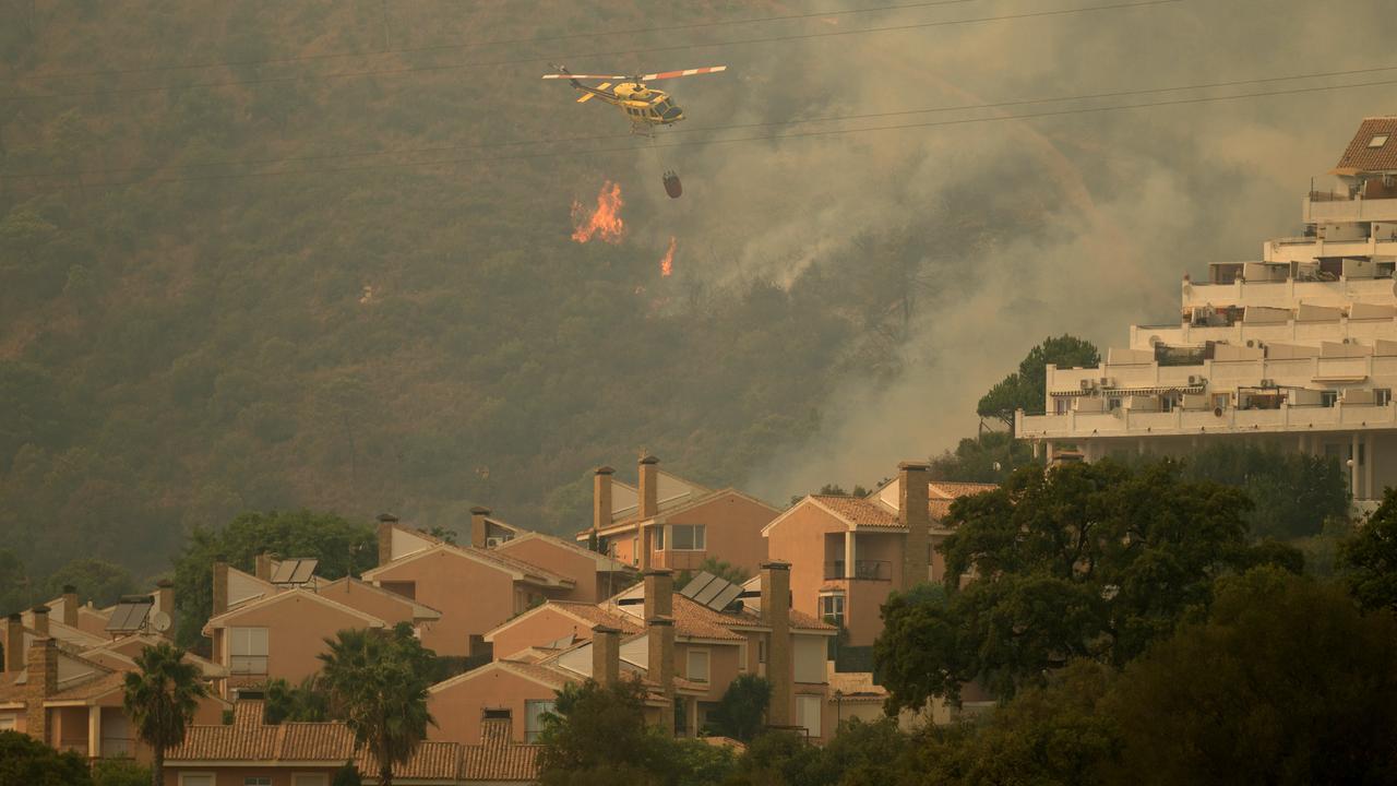 L'incendie, qui a lieu dans la province de Malaga, a fait un millier de déplacés [AFP - JORGE GUERRERO]