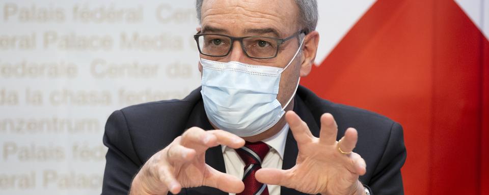 Le président de la Confédération Guy Parmelin lors d'une conférence de presse du Conseil fédéral. [Keystone - Peter Klaunzer]