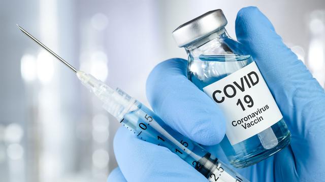 Gros plan sur le vaccin contre le Covid-19. [Depositphotos - SSilver]