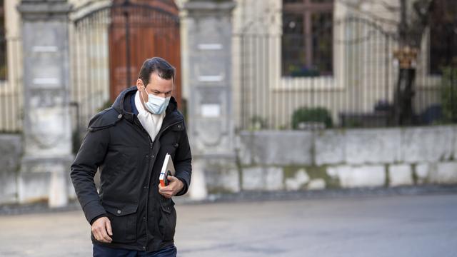 Pierre Maudet arrive au Palais de justice pour le troisième jour de son procès. [Keystone - Martial Trezzini]