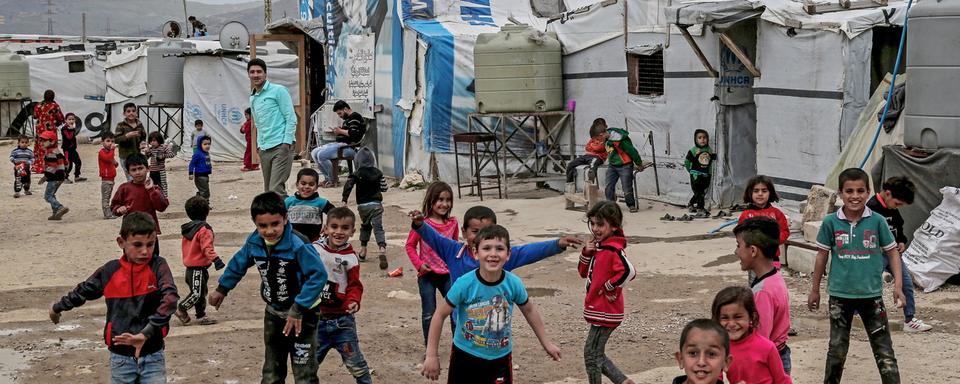 Ces petits réfugiés syriens font partie des nombreux enfants dont l'éducation est mise à mal par la situation économique et politique au Liban. [Nabil Mounzer]