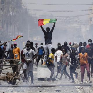 Sénégal : Pillages et émeutes cristallisent la crise politique. [AP via Keystone - Leo Correa]