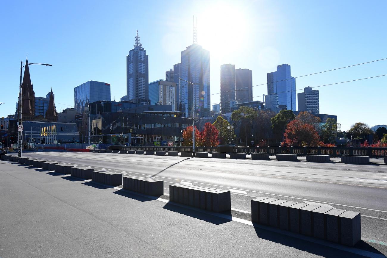 Les rues sont vides à Melbourne, le 2 juin 2021. [Keystone/epa - James Ross]