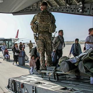 Le sort des réfugiés afghans est déjà au coeur du débat en Europe. [Reuters - Ben Shread]