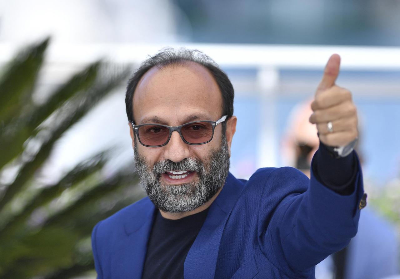 Le metteur en scène iranien Asghar Farhardi à Cannes pour son film "Un héros" ("Ghahreman"). [Anadolu Agency via AFP - Mustafa Yalcin]