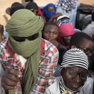Des migrants principalement nigériens se dirigent vers la Libye depuis Agadez, au Niger, lundi 4 juin 2018. Des migrants de toute l'Afrique subsaharienne (Mali, Gambie, Guinée, Côte d'Ivoire, Niger et autres) font partie de la migration de masse vers l'Europe, certains fuyant la violence, d'autres espérant simplement gagner leur vie. [Keystone/AP Photo - Jerome Delay]
