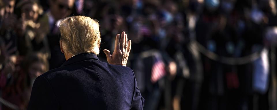 Les pardons présidentiels que Donald Trump pourraient accorder sont au centre de l'attention. [Keystone/EPA - Samuel Corum]