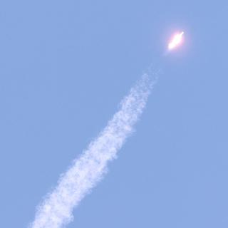 Une fusée dans le ciel. [EPA/Yonhap/Keystone - Pool South Korea Out]