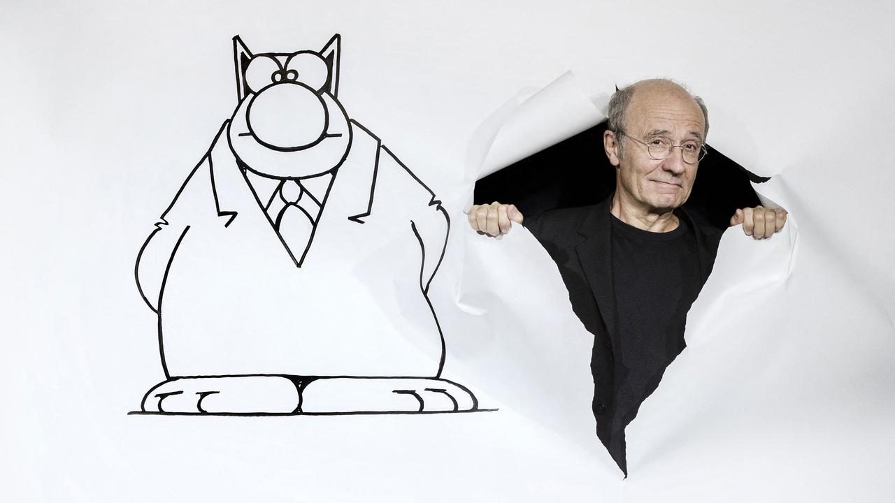 Le dessinateur belge Philippe Geluck et son fameux Chat. [AFP - Joël Saget]