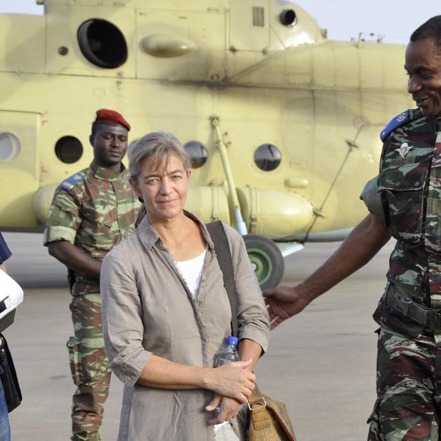 FILE - In this April 24, 2012, file photo, released Swiss hostage Beatrice Stoeckli, left, stands in Ouagadougou, Burkina Faso, following arrival by helicopter from Timbuktu, Mali, after being handed over by militant Islamic group Ansar Dine. SwitzerlandâÄ&#x2122;s Foreign Ministry said Friday, Oct. 8, 2020, that Stoeckli has been killed by an Islamist group. The ministry said it was informed by French authorities that the hostage had been âÄ&#x153;killed by kidnappers of the Islamist terrorist organization JamaâÄ&#x2122;at Nusrat al-Islam Muslimeen about a month ago.âÄ Stoeckli was kidnapped four years ago. (AP Photo/Brahima Ouedraogo, File) [AP via Keystone - Brahima Ouedraogo]