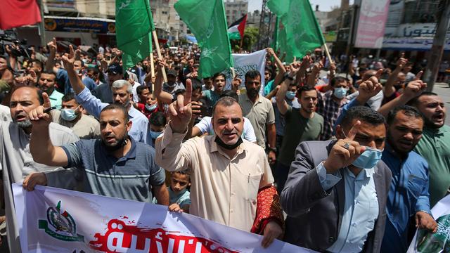 Supporters du Hamas célébrant la trêve à Gaza, 21.05.2021. [Reuters - Ibraheem Abu Mustafa]