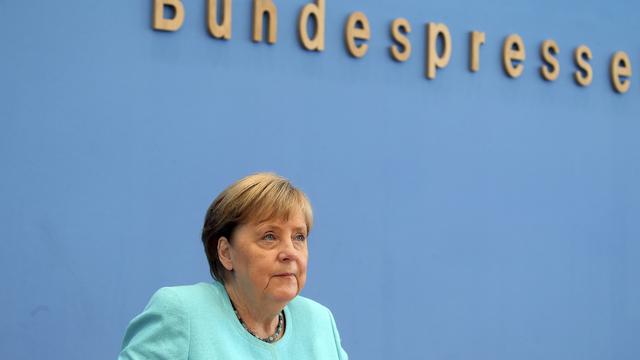 La chancelière allemande Angela Merkel a donné sa dernière conférence de presse estivale. [Keystone - AP/Wolfgang Kumm]