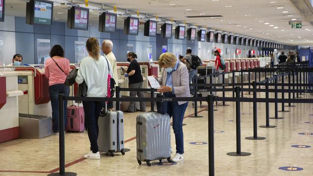 L'agressivité de la clientèle pèse sur lepersonnel d'embarquement à l'aéroport de Cointrin. [Keystone - Salvatore Di Nolfi]