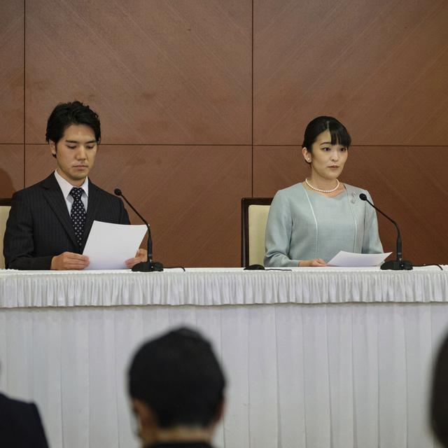 La princesse Mako, nièce de l'empereur du Japon, s'est mariée mardi avec son fiancé roturier Kei Komuro. [Keystone - Nicolas Datiche]