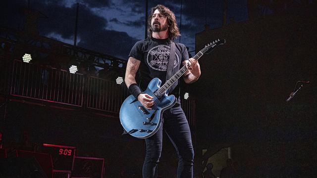 Le chanteur et guitariste des Foo Fighters Dave Grohl sur scène à Colombus, dans l'Ohio aux Etats-Unis, le 19 mai 2019. [Keystone - Amy Harris/Invision/AP]