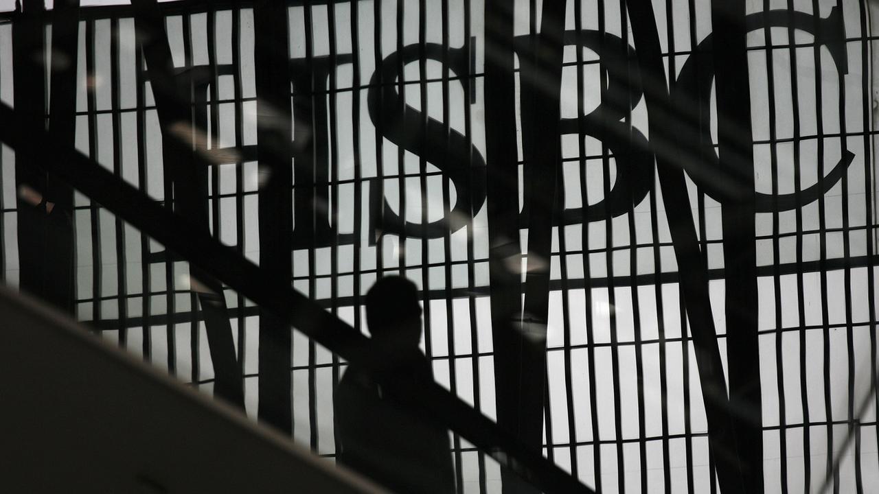 HSBC compte supprimer une centaine de postes en Suisse. [Keystone - Vincent Yu]