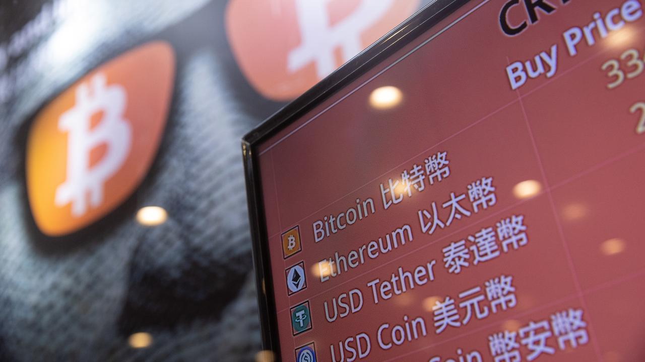 L'annonce de Pékin a entraîné une chute du cours des monnaies virtuelles. [Keystone - Jérôme Favre]