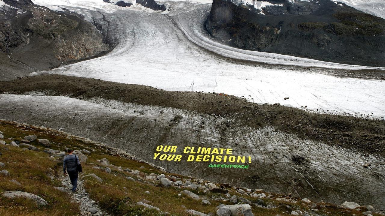 Alliance de six ONG suisses pour lutter contre la crise du climat et de la biodiversité. [KEYSTONE - JEAN-CHRISTOPHE BOTT]
