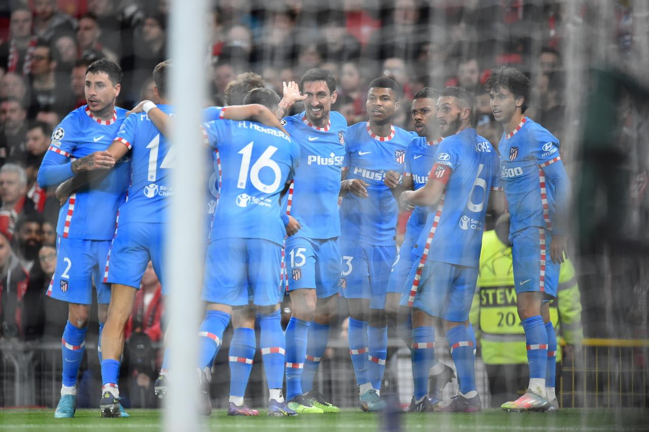 La joie des "Colchoneros" après la réussite de Lodi. L'Atlético retrouve les quarts de finale. [AP - Peter Powell]