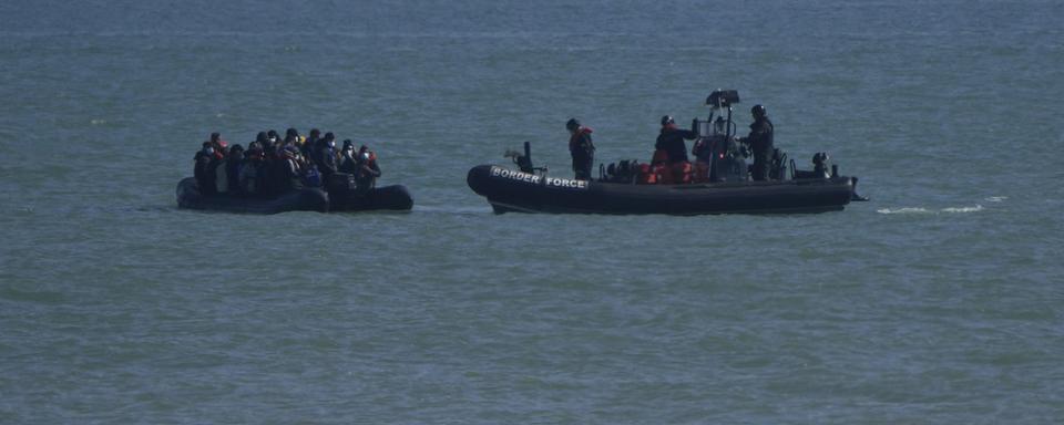 Quelque 28'000 migrants ont traversé la Manche l'année passée. [AP - Alastair Grant]