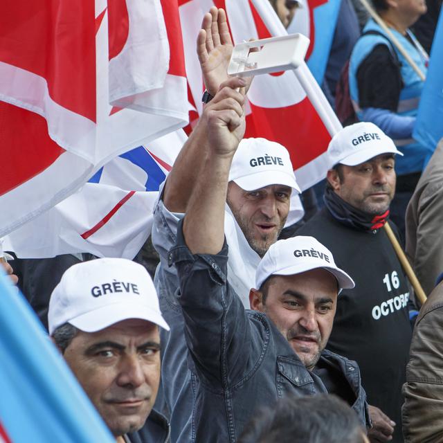 Les ouvriers du bâtiment lors de la grève des maçons à Genève. [Keystone - Salvatore Di Nolfi]