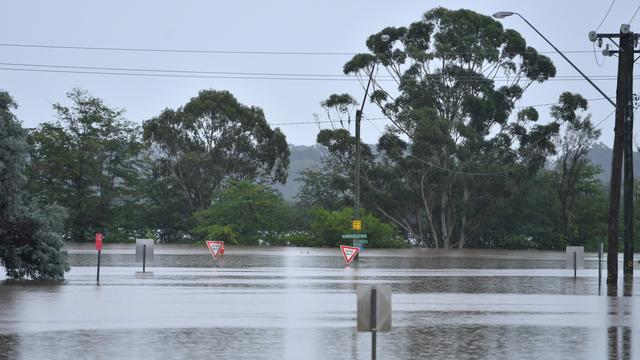 Les inondations qui frappent depuis une semaine la côte Est de l'Australie ont fait 20 morts. [Keystone/EPA - Dean Lewins]