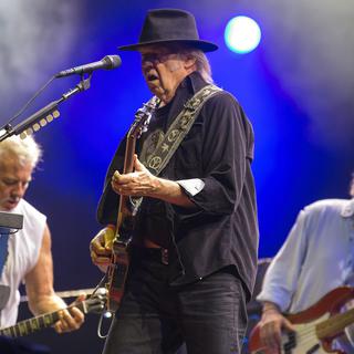 Neil YOung et son groupe "Crazy Horse", au Paléo Festival en 2013. [Keystone - Salvatore Di Nolfi]