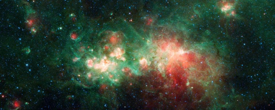 La nébuleuse de formation d'étoiles W51 est l'une des plus grandes "usines à étoiles" de la Voie lactée. Les "usines à étoiles" comme celle-ci peuvent fonctionner pendant des millions d'années. [NASA - JPL-Caltech]