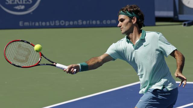 Roger Federer prend sa retraite sportive. [AP Photo - Al Behrman]
