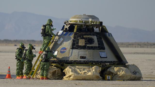 La capsule spatiale Starliner revient sur Terre après sa première mission d'essai à vide. [EPA/ Keystone - Bill Ingalls]