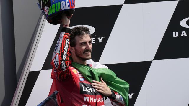 La joie de Francesco Bagnaia après sa victoire au GP d'Italie. [Keystone - Antonio Calanni]