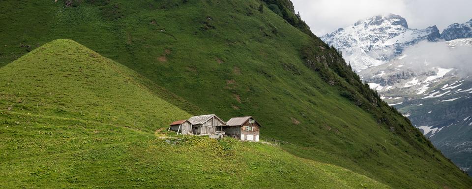 Une ferme dans le canton d'Uri. [Keystone - Arno Balzarini]