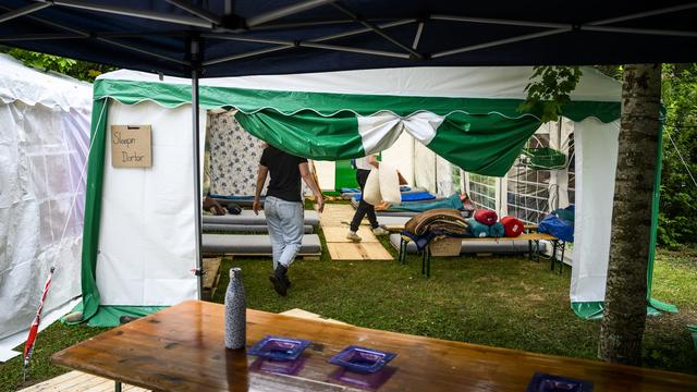 Le campement a été utilisé pendant un mois dans les jardins de la Haute école de travail social de Lausanne (HETSL). [Keystone - Jean-Christophe Bott]