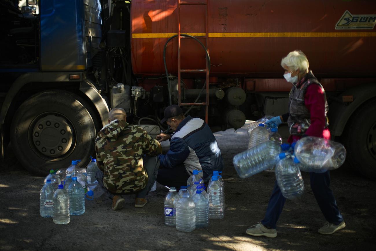 L'eau est devenue une denrée rare en Ukraine. [Keystone - Francisco Seco]