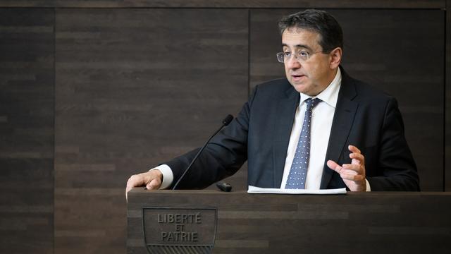 Pascal Broulis, alors conseiller d'Etat vaudois, lors de la présentation des comptes 2021, en avril 2022. [KEYSTONE - Jean-Christophe Bott]