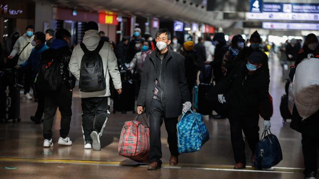 La population chinoise jubile à l'annonce de la fin de la quarantaine liées au Covid. [KEYSTONE - WU HAO]