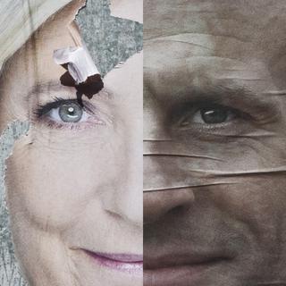 Affiches de campagne de Marine Le Pen et d'Emmanuel Macron. [Hans Lucas/AFP - Thibaut Durand]