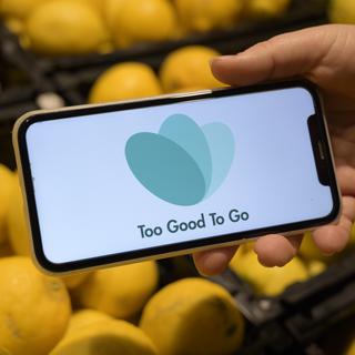 Le logo de Too Good to Go sur un smartphone. [Keystone - Leandre Duggan]