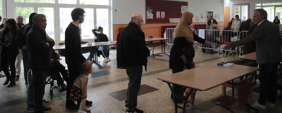 Un bureau de vote à Montreuil. [AP Photo/Keystone - Lewis Joly]