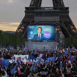 Emmanuel Macron réélu pour un deuxième mandat. [AP Photo/Keystone - Christophe Ena]