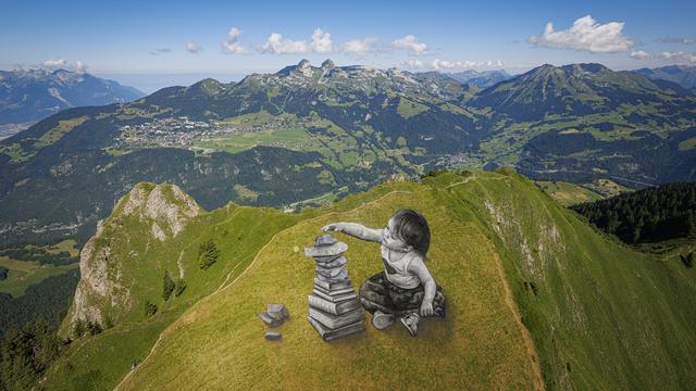 Fresque de l'artiste Saype au-dessus de Villars (VD). [Keystone - Valentin Flauraud]