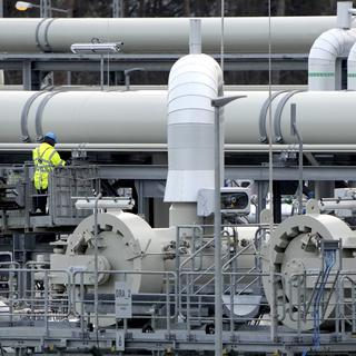 Les tuyaux des installations d'atterrissage de la ligne de gaz "Nord Stream 2" sont photographiés à Lubmin, dans le nord de l'Allemagne, le 15 février 2022. [Keystone - Michael Sohn]