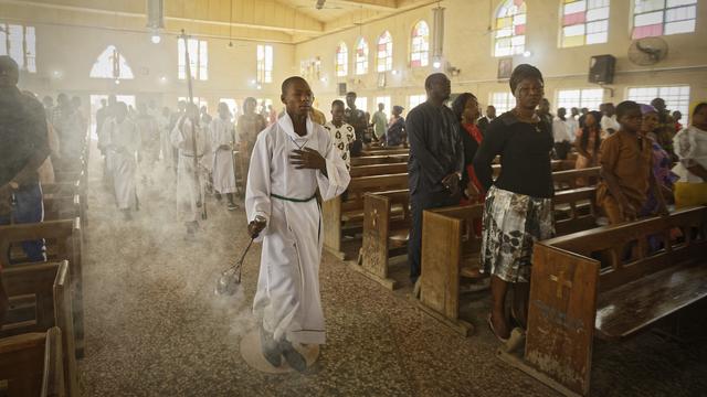 Une célébration dans une église catholique à Kano, dans le nord du Nigéria. [Keystone/AP Photo - Ben Curtis]