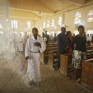 Une célébration dans une église catholique à Kano, dans le nord du Nigéria. [Keystone/AP Photo - Ben Curtis]