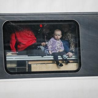 Un enfant quitte l'Ukraine environ chaque seconde. [Reuters - Gleb Garanich]